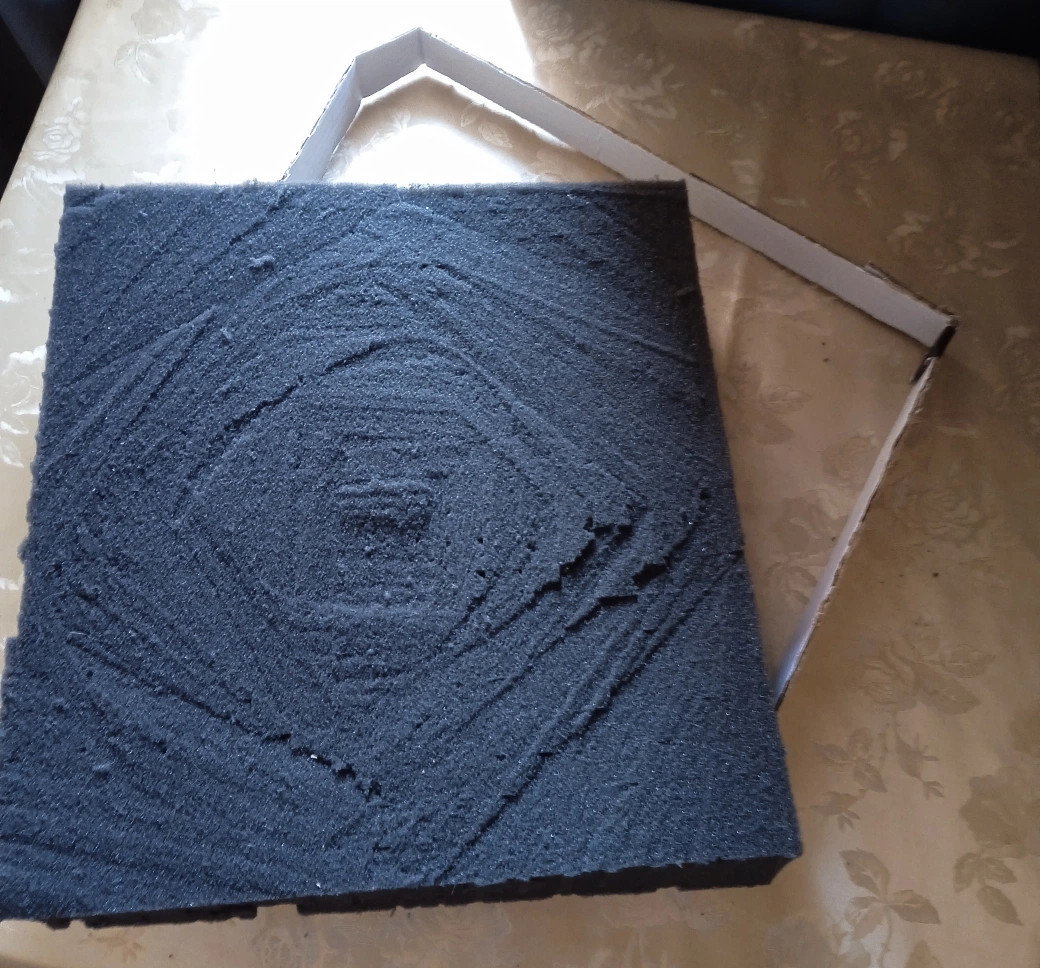 Tapered wedge of foam removed after angled cut for Maschine MK3 case slope