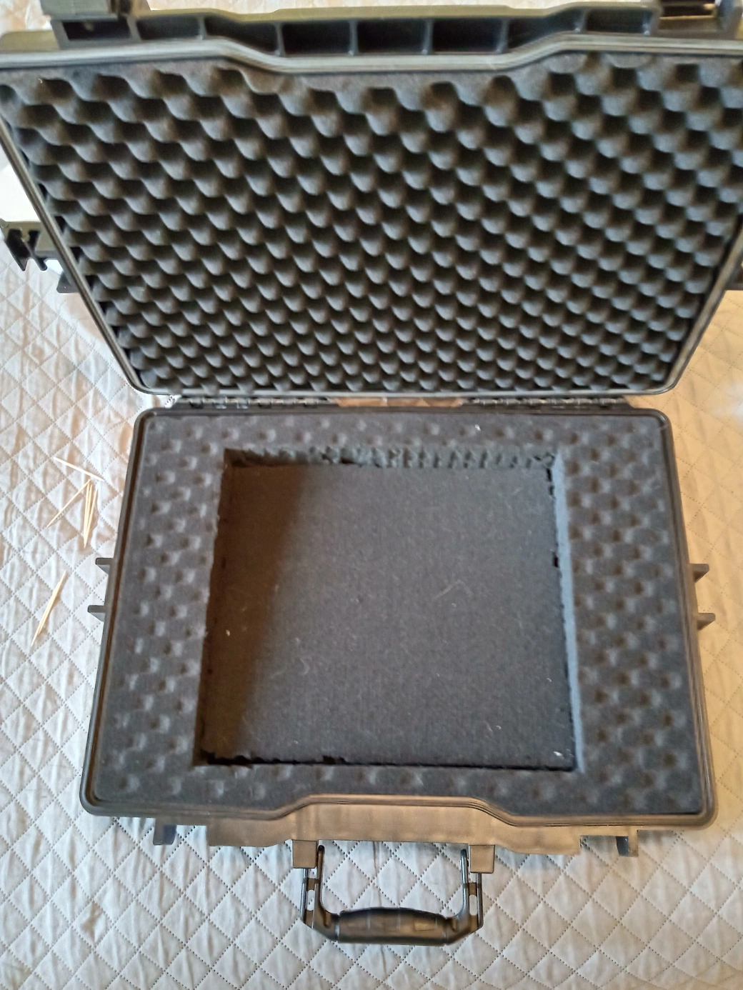 Angled foam block placed back into hermetic tool case for test fitting with Maschine MK3